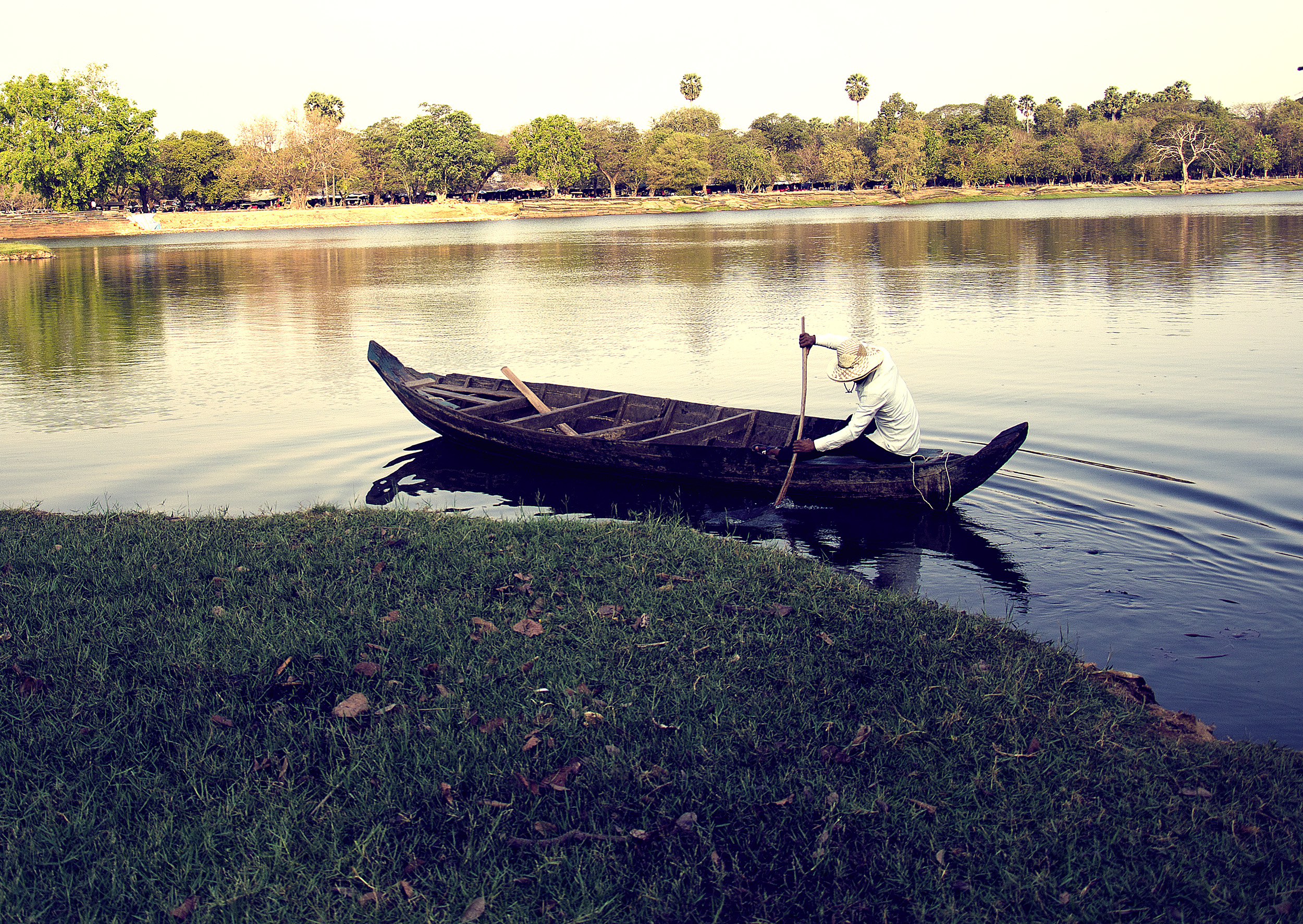 A dugout canoe ride across Angkor Wat's Moat!